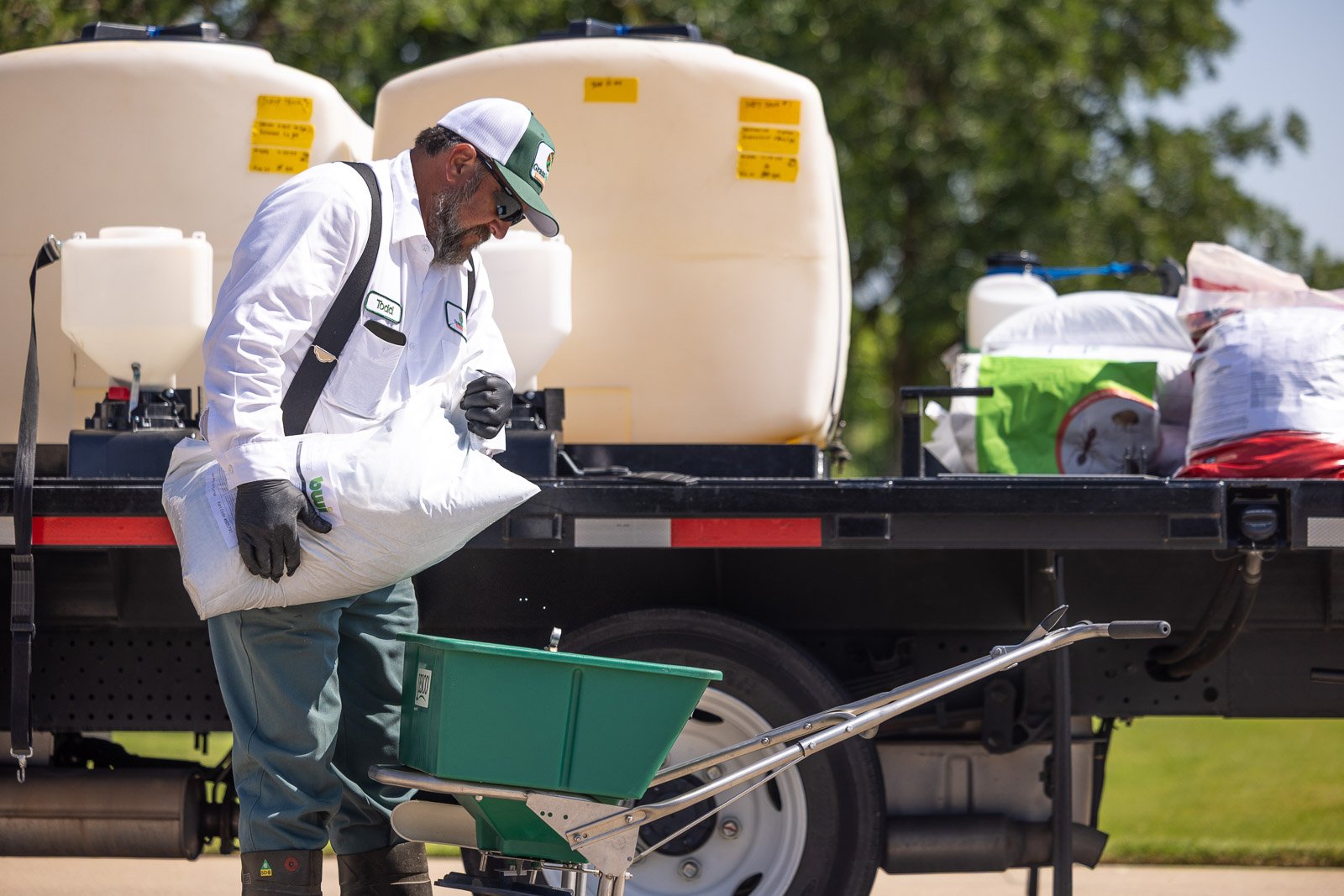 lawn technician crew getting ready to do lawn treatment 2