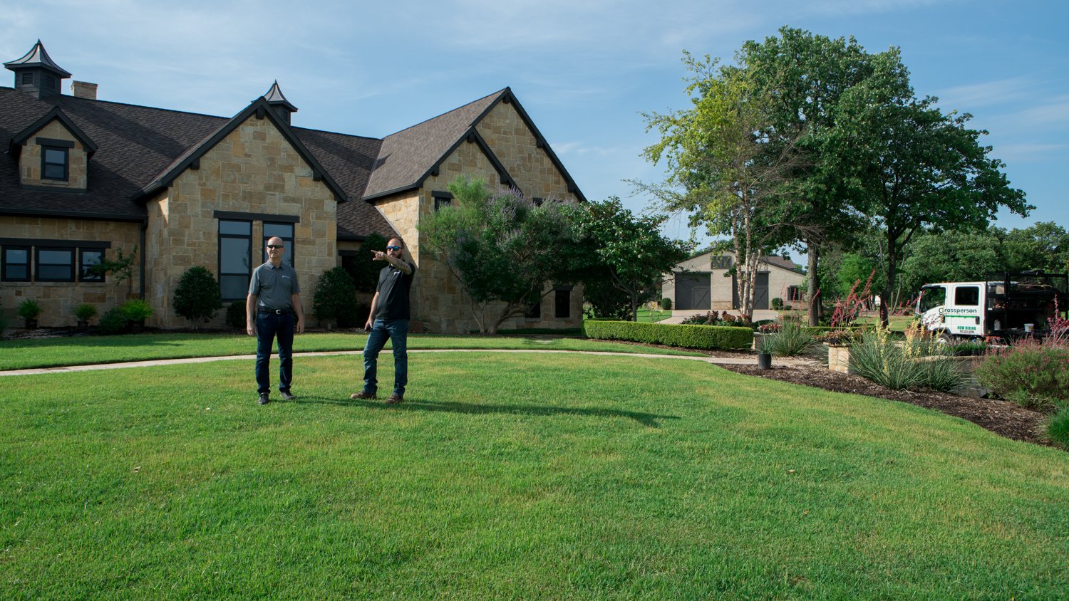 Lawn care technicians in lawn in North Texas