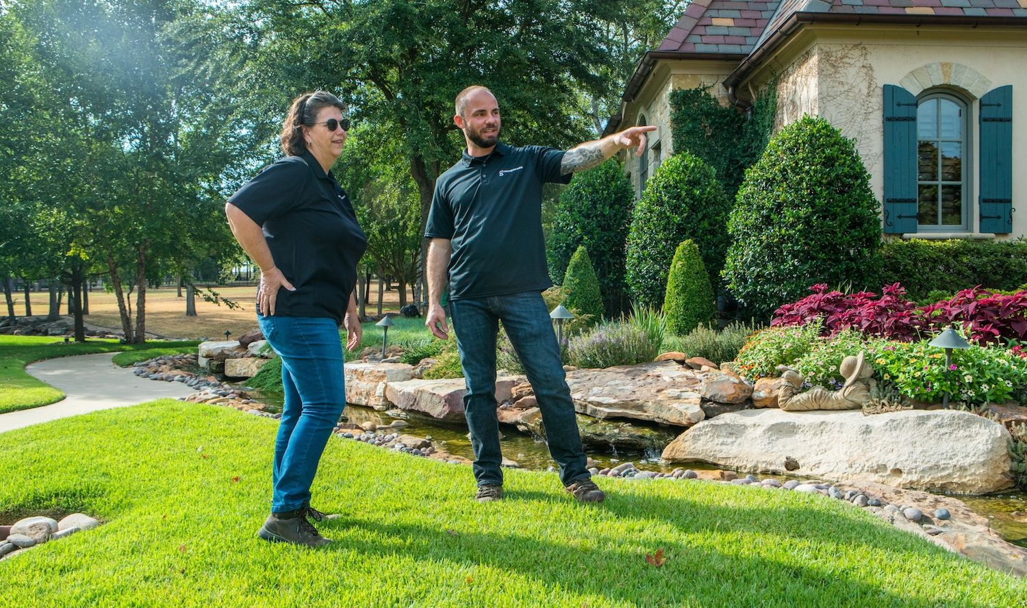 Grassperson team providing tree and shrub care in North Texas
