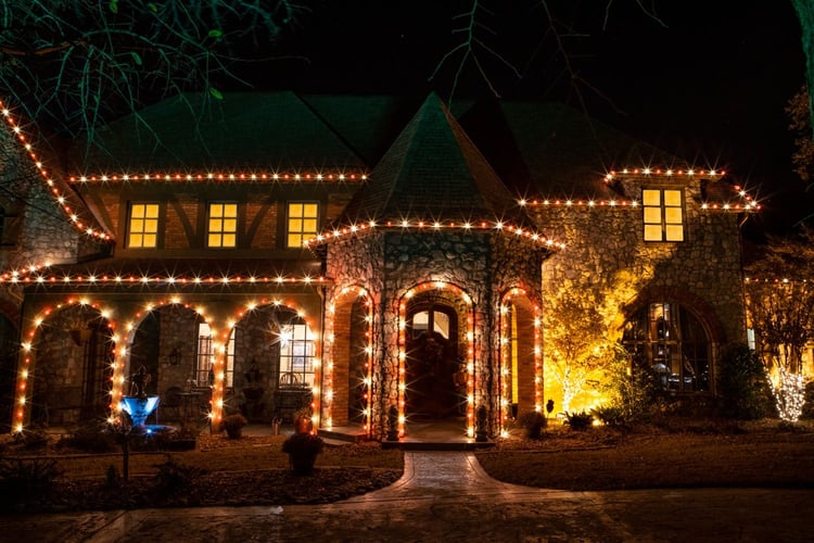 House with professional holiday lighting services