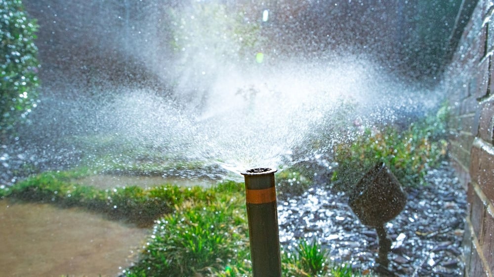 irrigation system head spraying water