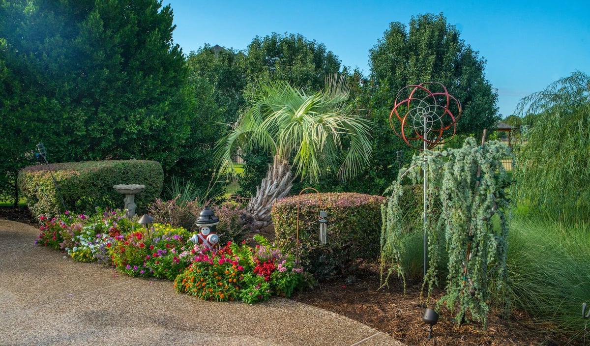 landscape bed with flowers and mulch