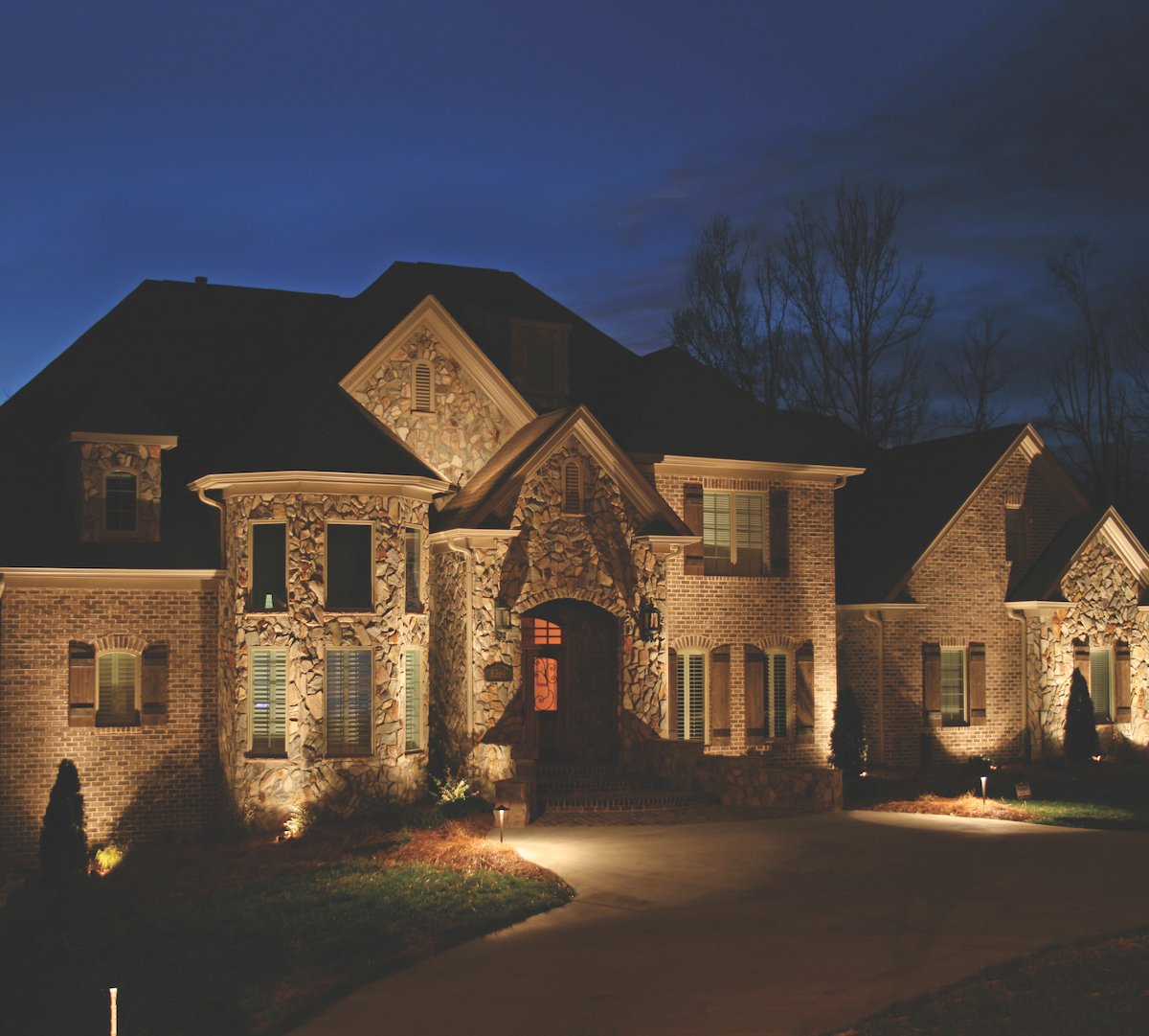 landscape lighting on large home