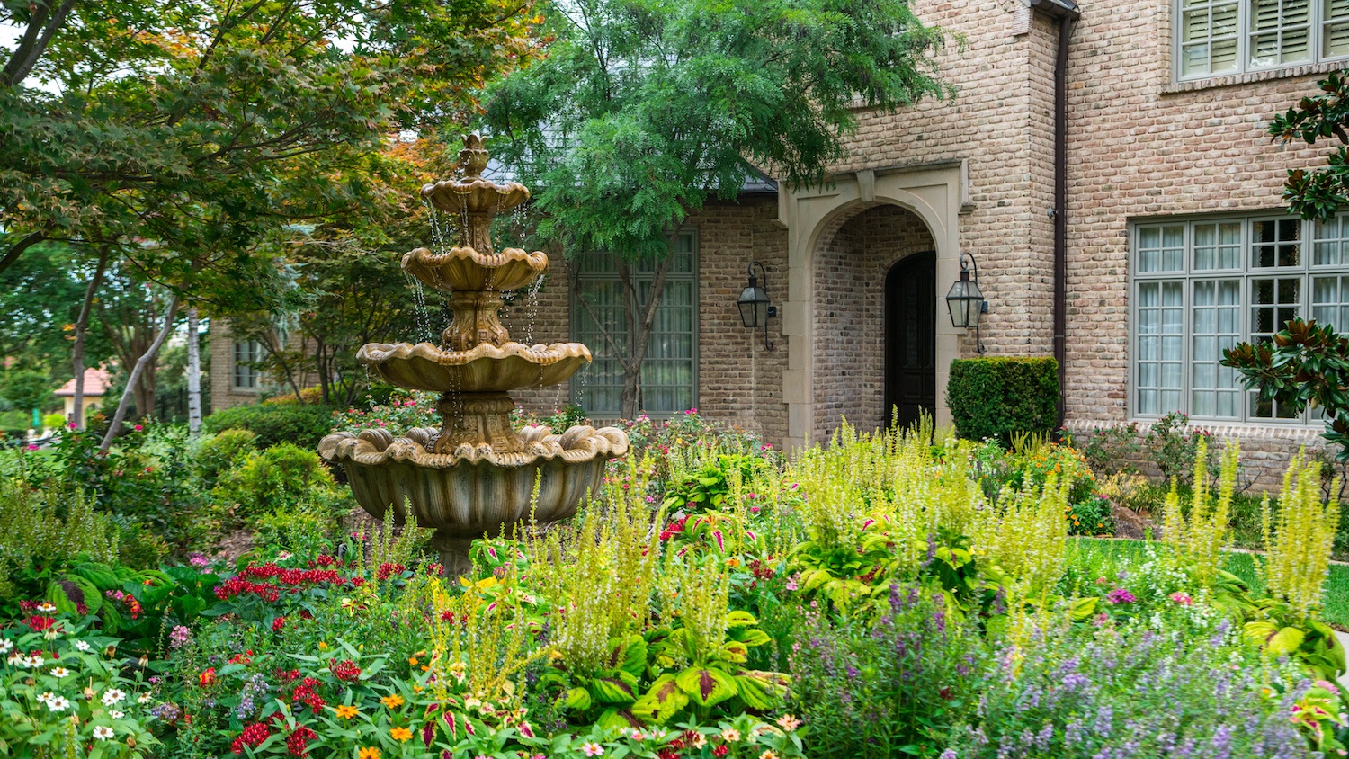 water fountain near garden area