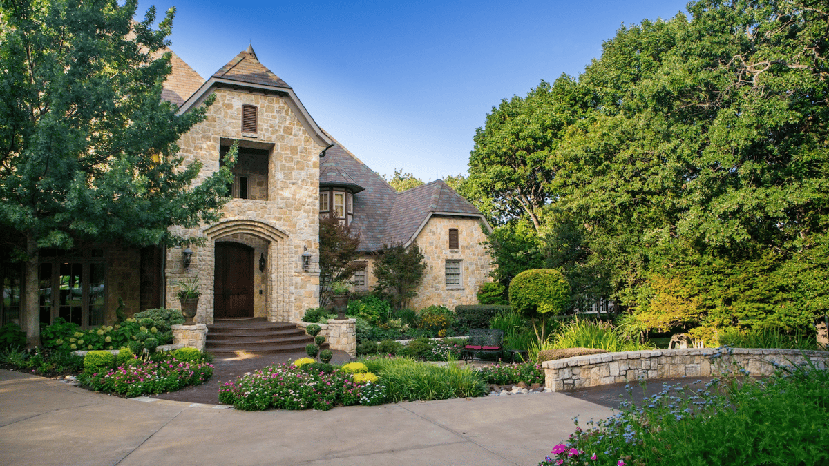 flowers plantings and stonework at front yard of home