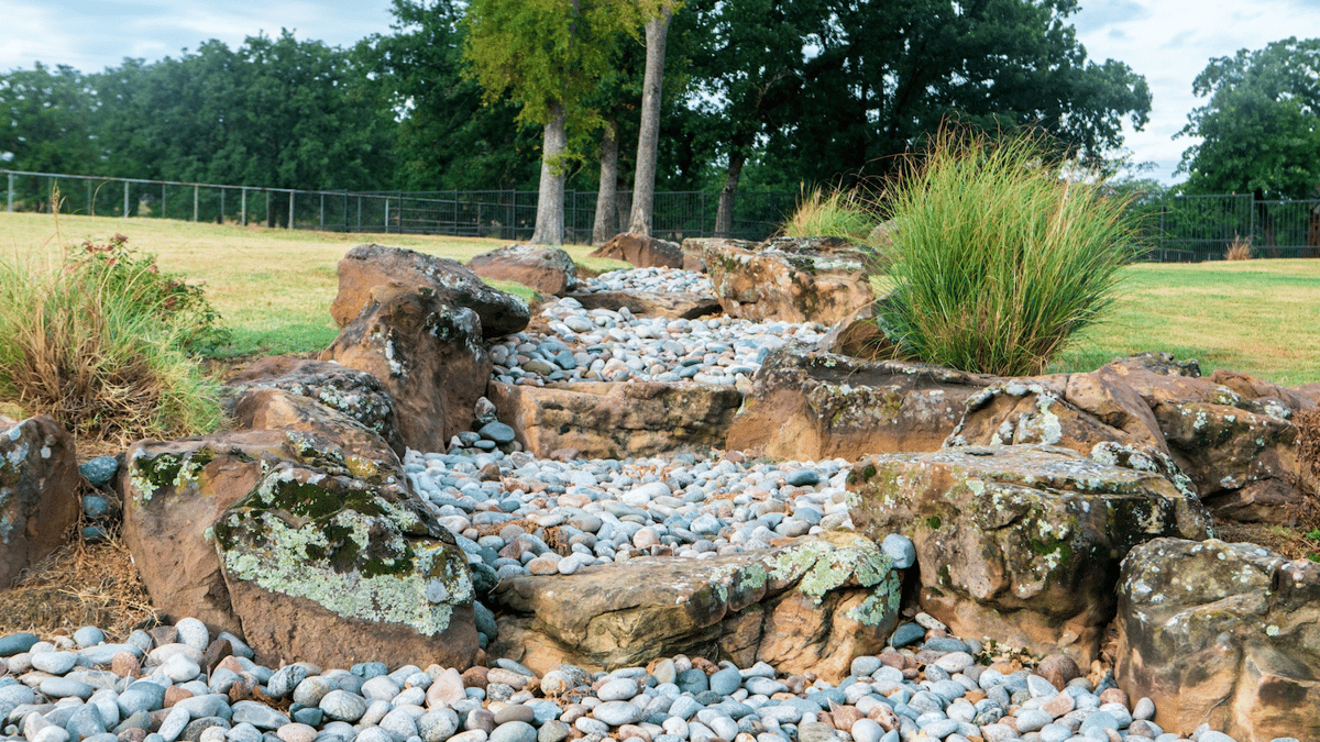 stones and boulders with native grasses