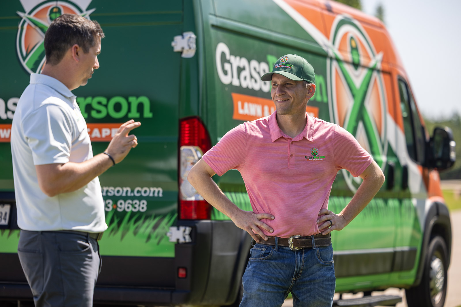 account managers talking in front of truck 