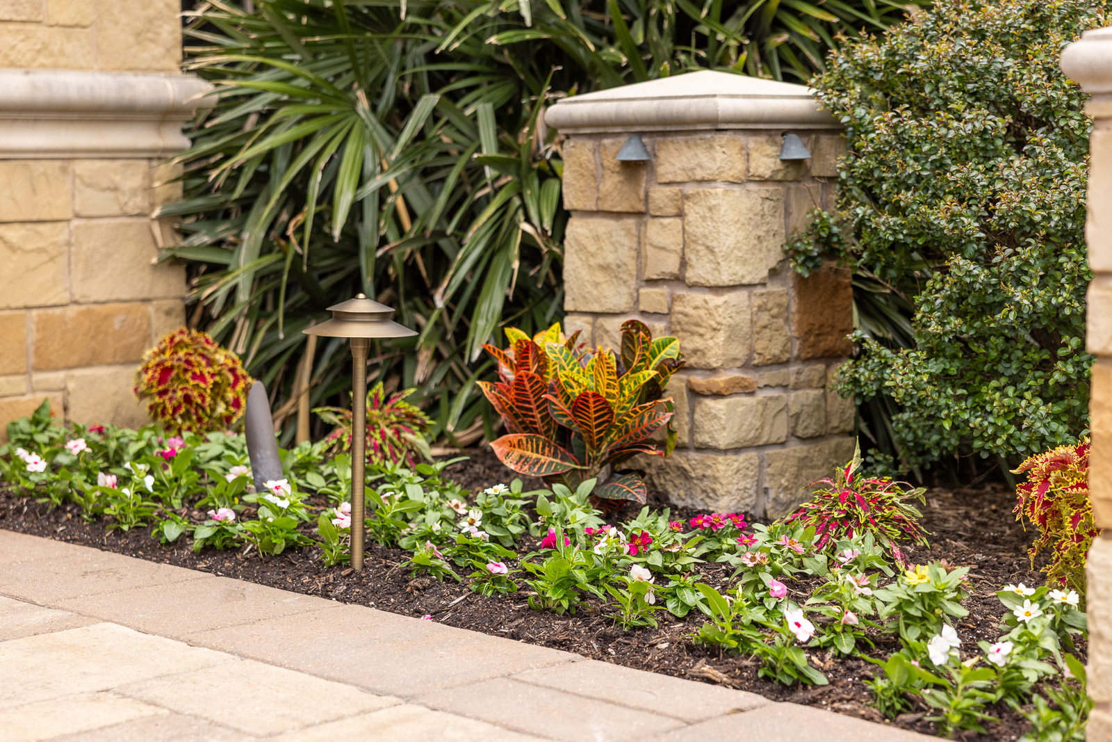 annuals planted along driveway