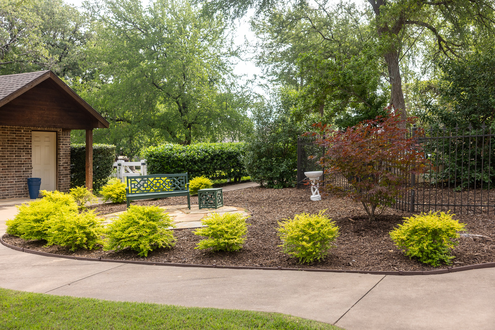 commercial landscape beds outdoor seating 
