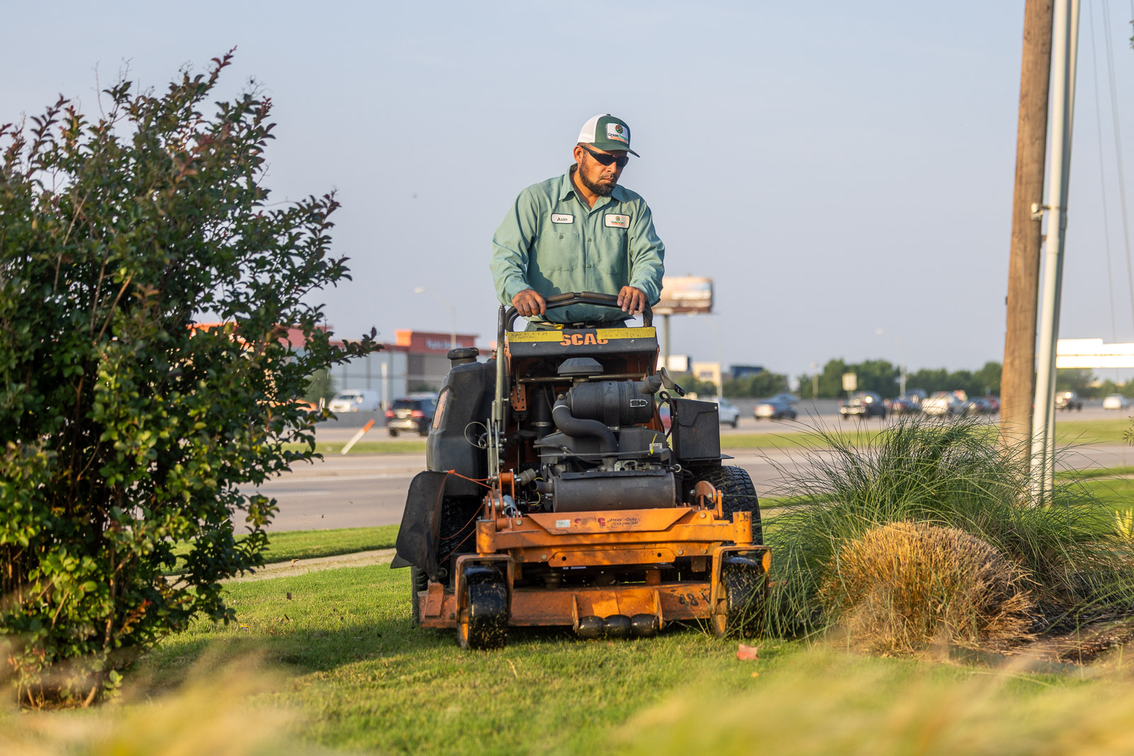 commercial maintenance crew mowing lawn 1