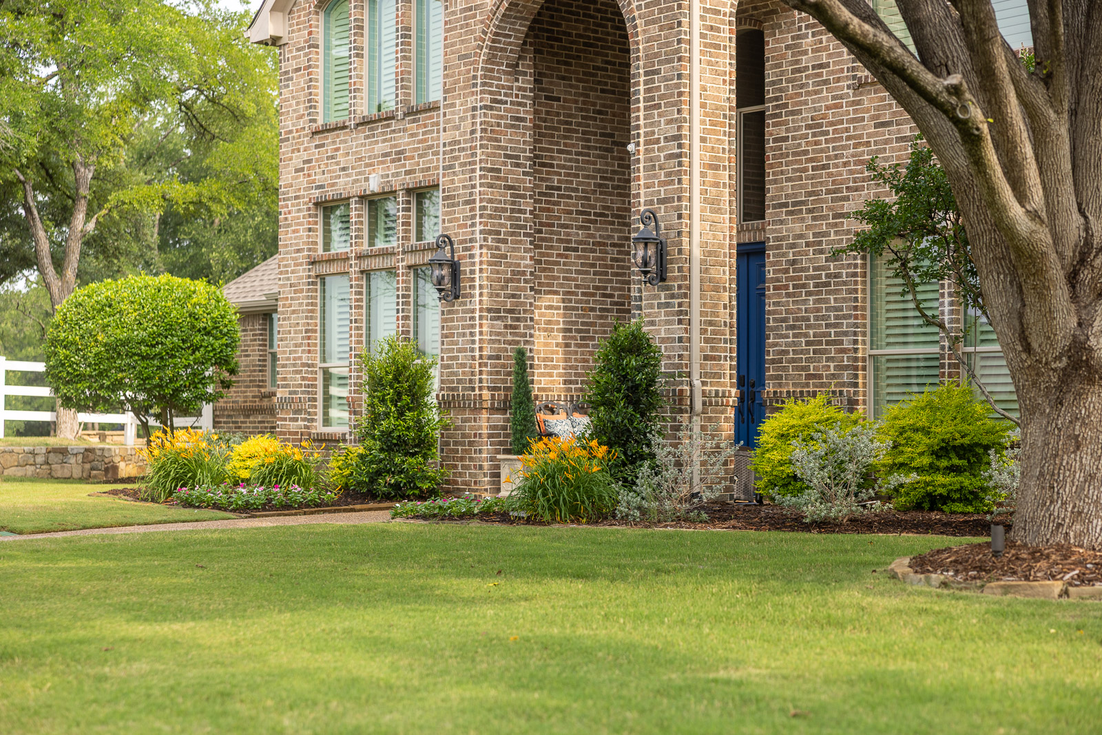 front of house landscape beds green lawn 