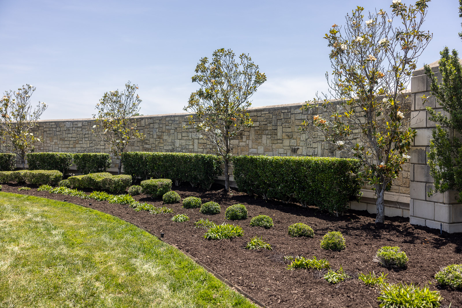 landscape beds hoa entrance fresh mulch 