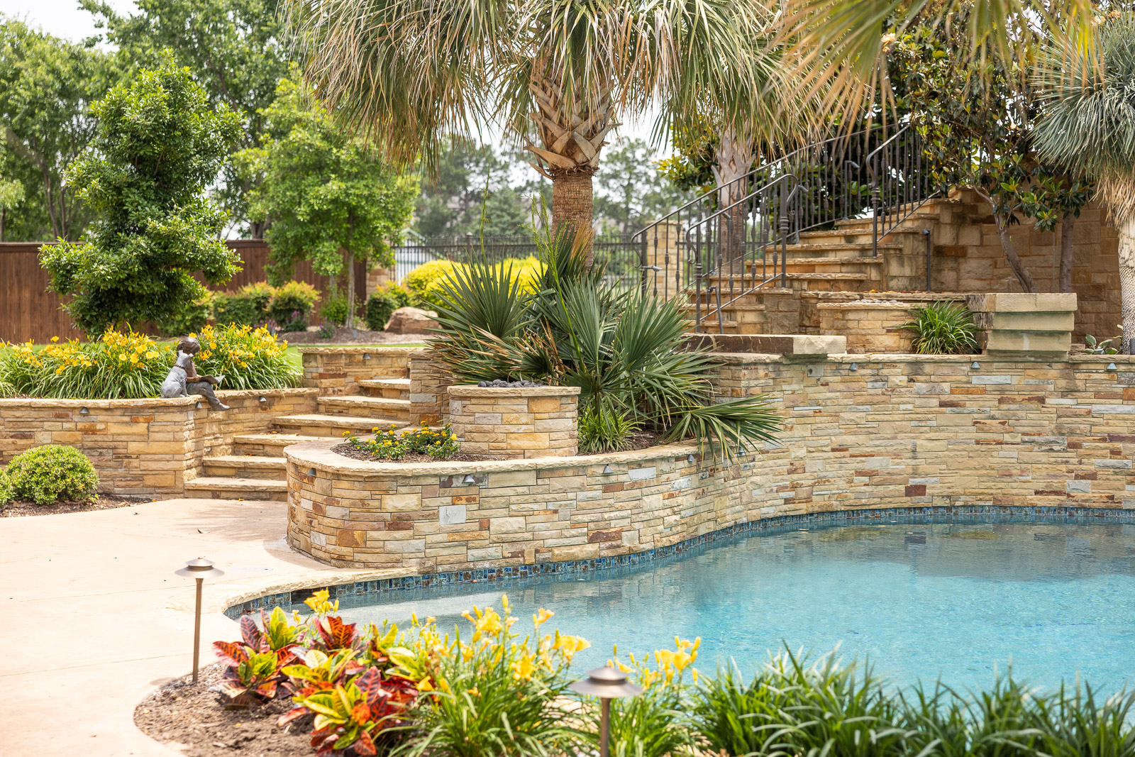 landscape beds tiered along pool 