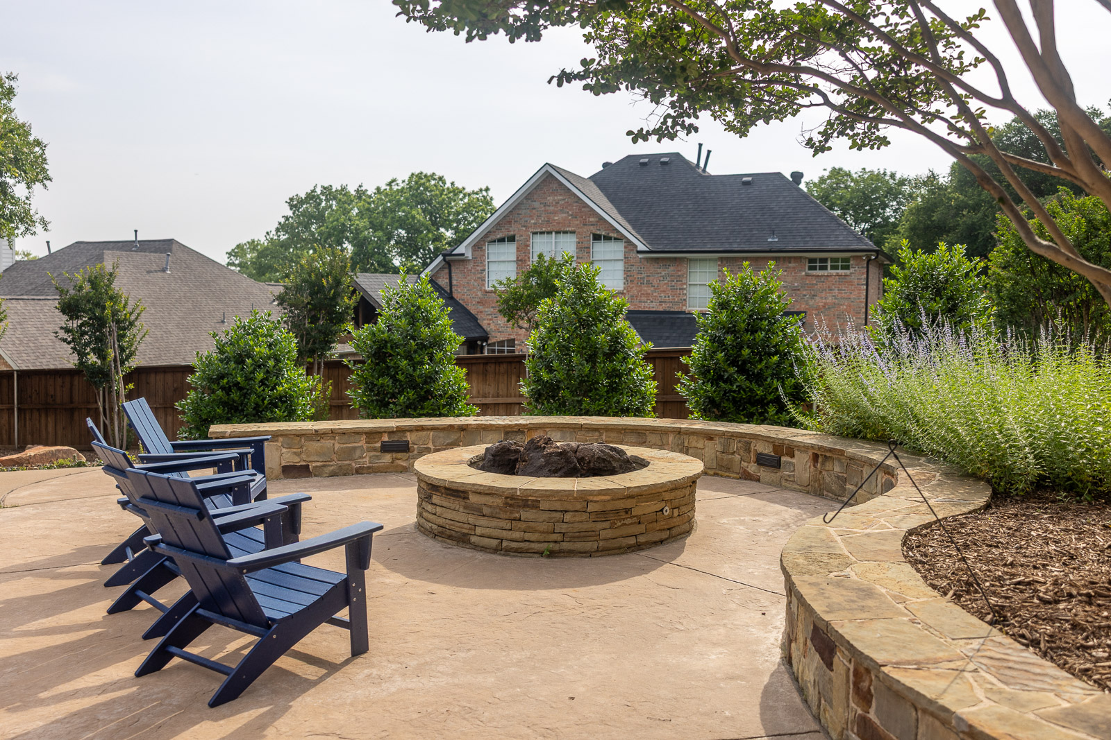 patio retaining wall fire pit backyard 