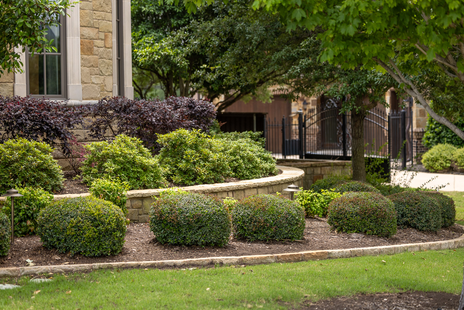 tiered landscape beds green lawn 